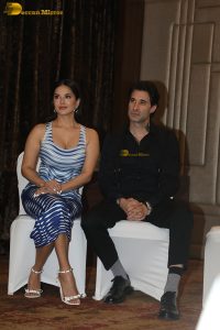 actress Sunny Leone in a blue dress at an event