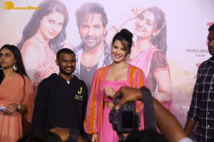 Sunny Leone in a pink dress attending the teaser launch of the Telugu film Ginna