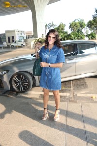 Sunny Leone in a denim dress at Mumbai Airport