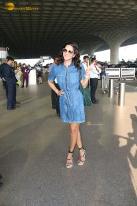 Sunny Leone in a denim dress at Mumbai Airport
