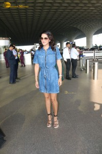 Sunny Leone in a denim dress at Mumbai Airport