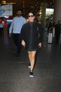 actress sunny leone in a black dress at airport