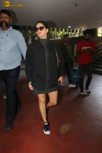 actress sunny leone in a black dress at airport