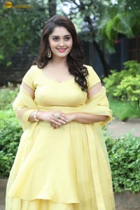 actress surbhi puranik beautiful in a yellow lehenga choli