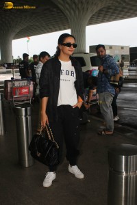 actress surveen chawla in black track suit at airport