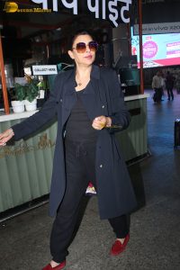 former miss universe and bollywood actress Sushmita Sen in black dress at airport