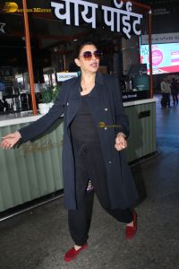 former miss universe and bollywood actress Sushmita Sen in black dress at airport