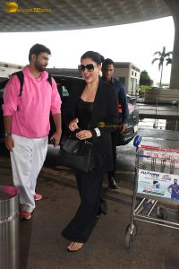 actress Sushmita Sen gorgeous in a black dress at airport