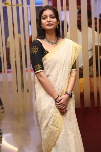 actress Swathi Reddy cute in a light yellow saree