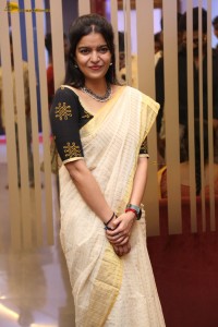 actress Swathi Reddy cute in a light yellow saree