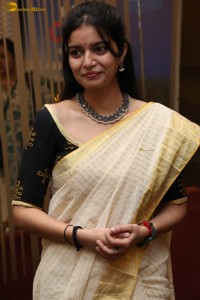 actress Swathi Reddy cute in a light yellow saree