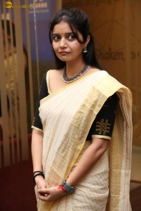 actress Swathi Reddy cute in a light yellow saree