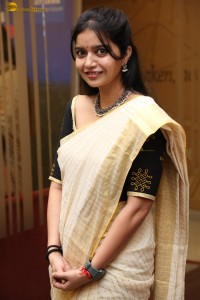 actress Swathi Reddy cute in a light yellow saree