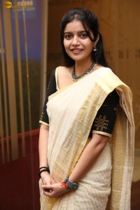 actress Swathi Reddy cute in a light yellow saree