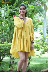 telugu actress Swathi Reddy stunning hot looks in a yellow mini dress