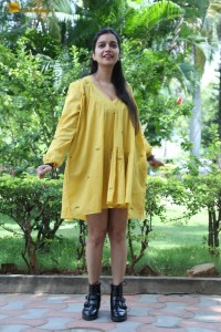 telugu actress Swathi Reddy stunning hot looks in a yellow mini dress