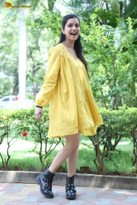 telugu actress Swathi Reddy stunning hot looks in a yellow mini dress