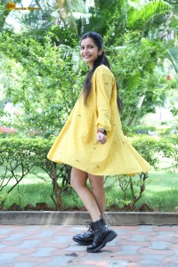 telugu actress Swathi Reddy stunning hot looks in a yellow mini dress