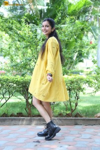 telugu actress Swathi Reddy stunning hot looks in a yellow mini dress