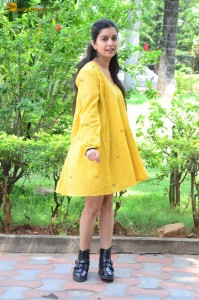 telugu actress Swathi Reddy stunning hot looks in a yellow mini dress