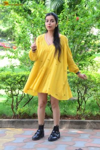 telugu actress Swathi Reddy stunning hot looks in a yellow mini dress