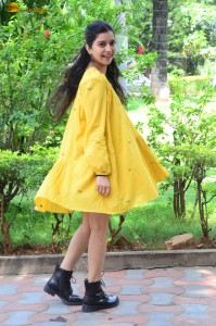 telugu actress Swathi Reddy stunning hot looks in a yellow mini dress