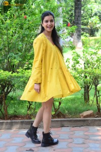 telugu actress Swathi Reddy stunning hot looks in a yellow mini dress