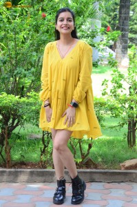 telugu actress Swathi Reddy stunning hot looks in a yellow mini dress