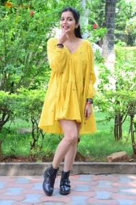 telugu actress Swathi Reddy stunning hot looks in a yellow mini dress