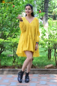 telugu actress Swathi Reddy stunning hot looks in a yellow mini dress