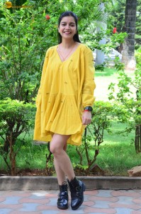 telugu actress Swathi Reddy stunning hot looks in a yellow mini dress