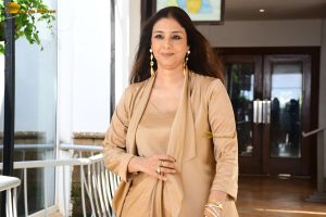 Indian actress tabu beautiful in a gold color dress