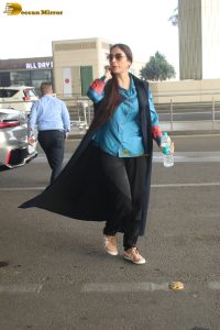 actress tabu in blue short and black pants