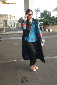 actress tabu in blue short and black pants