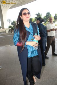 actress tabu in blue short and black pants