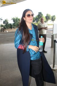 actress tabu in blue short and black pants