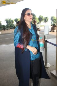 actress tabu in blue short and black pants