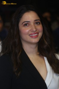 Indian Actress Tamannaah Bhatia red-hot looks in a mini skirt at a movie function