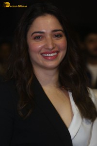 Indian Actress Tamannaah Bhatia red-hot looks in a mini skirt at a movie function