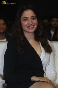 Indian Actress Tamannaah Bhatia red-hot looks in a mini skirt at a movie function