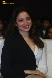 Indian Actress Tamannaah Bhatia red-hot looks in a mini skirt at a movie function