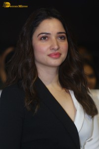 Indian Actress Tamannaah Bhatia red-hot looks in a mini skirt at a movie function