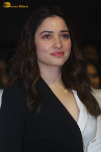 Indian Actress Tamannaah Bhatia red-hot looks in a mini skirt at a movie function