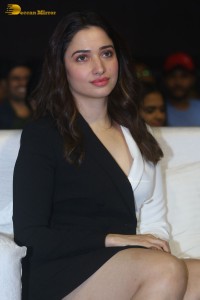 Indian Actress Tamannaah Bhatia red-hot looks in a mini skirt at a movie function