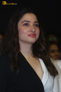 Indian Actress Tamannaah Bhatia red-hot looks in a mini skirt at a movie function