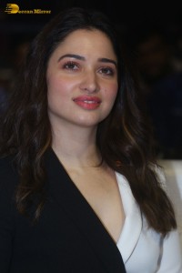 Indian Actress Tamannaah Bhatia red-hot looks in a mini skirt at a movie function