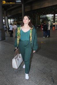 actress tamannaah bhatia dressed in green at the airport