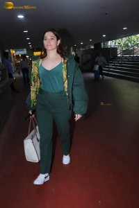 actress tamannaah bhatia dressed in green at the airport