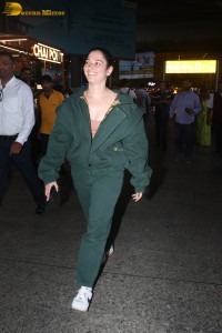 indian actress tamannaah bhatia hint of cleavage in green track suit