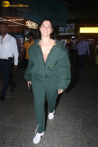 indian actress tamannaah bhatia hint of cleavage in green track suit